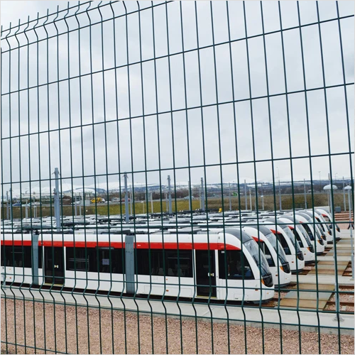 chicken wire under fence